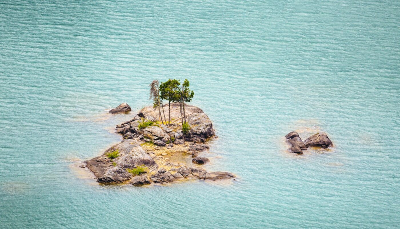 a small island in the middle of a body of water